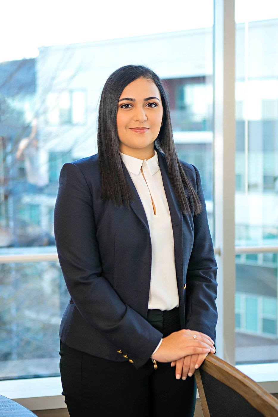 Shailey Shah standing in a conference room